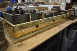 A brass fender.