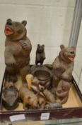 A collection of black forest carved bears.