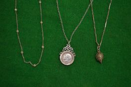 Three silver necklaces.