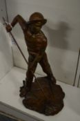J Dalbreuse, a bronze sculpture of a fishermen holding a net.