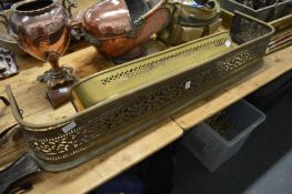 Two brass fenders.