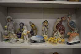 A shelf of decorative china.