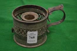 A plated candle holder.