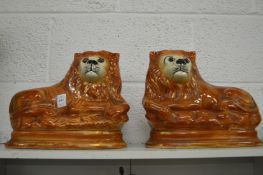 A pair of Staffordshire lions.