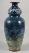 A LARGE ROYAL DOULTON STONEWARE POTTERY BLUE VASE. 13ins high.