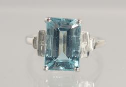 A GOOD 18CT WHITE GOLD 4.5CT AQUAMARINE AND DIAMOND DECO STYLE RING.