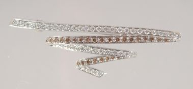 AN 18CT WHITE GOLD DIAMOND SET BROOCH.