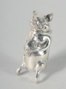 A SILVER PIG SWAG BAG VESTA.