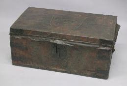 A 17TH CENTURY LEATHER COVERED TRAVELLING TRUNK, with plain brass studwork all over, the top and