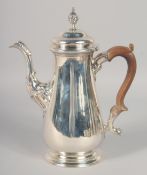 A GEORGE III SILVER COFFEE POT. Mark rubbed, maker E. W. Weighs 24oz.