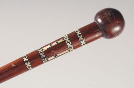 A SOLOMAN ISLAND CHIEF'S STICK.