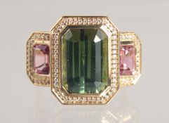A VERY FINE NATURAL GREEN TOURMALINE AND PINK TOURMALINE RING, 18CT GOLD.
