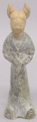 A CHINESE TERRACOTTA FIGURE.