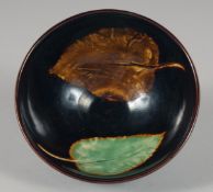 A CHINESE JIAN WARE 'LEAF' CUP, 11cm diameter.