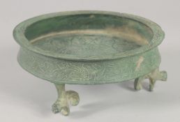 A RARE 12TH-13TH CENTURY PERSIAN SELJUK BRONZE FOOTED DISH, bearing the twelve zodiac symbols,