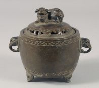 A CHINESE CAST BRONZE CENSOR the lid with dogs of fo handle. 5.5ins high