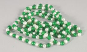 A PEARL AND JADE BEAD NECKLACE. 118cm long