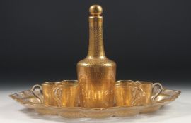 A HUNGARIAN GLASS LIQUEUR SET, tray and decanter.