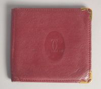 A CARTIER LEATHER WALLET