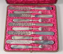 A GOOD SET OF SIX AGATE HANDLED KNIVES AND FORKS.