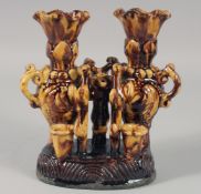 A TURKISH CANAKKALE GLAZED POTTERY SCRIBES STAND.
