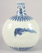 A CHINESE BLUE AND WHITE PORCELAIN MOON FLASK, decorated with a bird and carved flora, 29cm high.