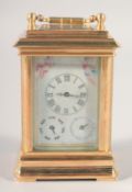 A BRASS MINIATURE CARRIAGE CLOCK with Sevres style porcelain panels. 3ins high.