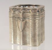 A DUTCH SILVER PILL BOX with ribbed decoration. 4cm high