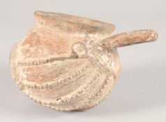 A 10TH-12TH CENTURY PERSIAN UNGLAZED POTTERY JUG, 11cm wide.