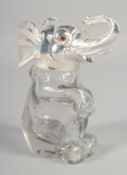 A SMALL GLASS AND SILVER-PLATED JAR AND COVER, modelled as a seated elephant. 5.5