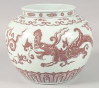 A CHINESE COPPER RED PORCELAIN 'KUI DRAGON' JAR, 19.5cm high.