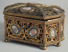 A GOOD 19TH CENTURY LOUIS XV DESIGN PIERCED GILT METAL CASKET, set with fifteen Sevres circular oval