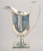 A HELMET SHAPED SILVER CREAM JUG. Sheffield 1900.