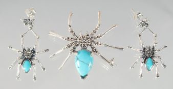 A SILVER TURQUOISE MARCASITE SPIDER BROOCH AND EARRINGS.