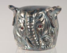 A CAST RUSSIAN SILVER AND SILVER GILT VODKA CUP, modelled as an elephant. 9cm wide