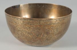 A 19TH CENTURY PERSIAN QAJAR ENGRAVED BRASS BOWL, 12.5cm diameter.