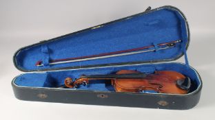 A CASED VIOLIN AND BOW.