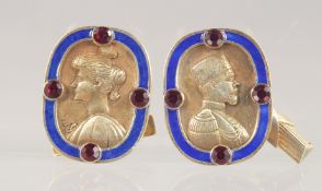 A PAIR OF RUSSIAN SILVER AND ENAMEL CUFFLINKS depicting the busts of a man and woman.