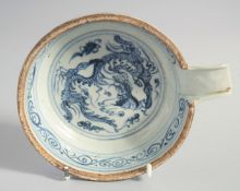 A CHINESE YUAN STYLE BLUE AND WHITE DRAGON BOWL, with spout, 12.5cm diameter (excl. spout).