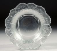 A LALIQUE GLASS BOWL the rim moulded as a band of leaves. 6.5ins diameter.