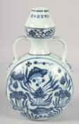 A CHINESE BLUE AND WHITE PORCELAIN TWIN HANDLE MOON FLASK, decorated with fish and aquatic flora,