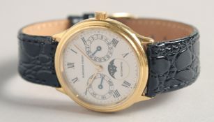 A SUPERB AUDEMARS PIQUET 18CT YELLOW GOLD DAY DATE MOONFACE WRISTWATCH. No. 18357 with a leather