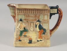A ROYAL DOULTON PICKWICK POTTERY TWO HANDLED JUG. 5ins high.