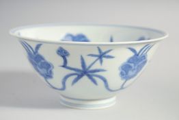 A CHINESE BLUE AND WHITE MING STYLE BOWL, the interior and exterior painted with flower heads,