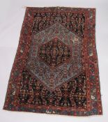 AGOOD PERSIAN CARPET, pale blue ground, with all over stylised decoration. 6'5