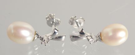 A PAIR OF 18CT WHITE GOLD PEARL AND DIAMOND DROP EARRINGS.
