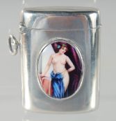 AN EDWARD VII PLAIN SILVER VESTA, with an oval of a nude, London 1902.