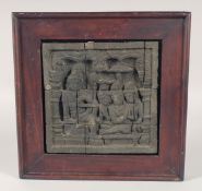 A CARVED STONE TEMPLE TILE, framed, tile 19cm square.