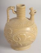 A CHINESE YAOZHOU STYLE CHICKEN FORM EWER, with relief decoration, 17.5cm high.