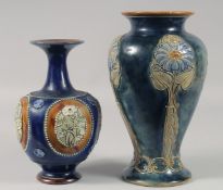 TWO ROYAL DOULTON BLUE FLORAL STONEWARE VASES. 10ins & 8ins high.
